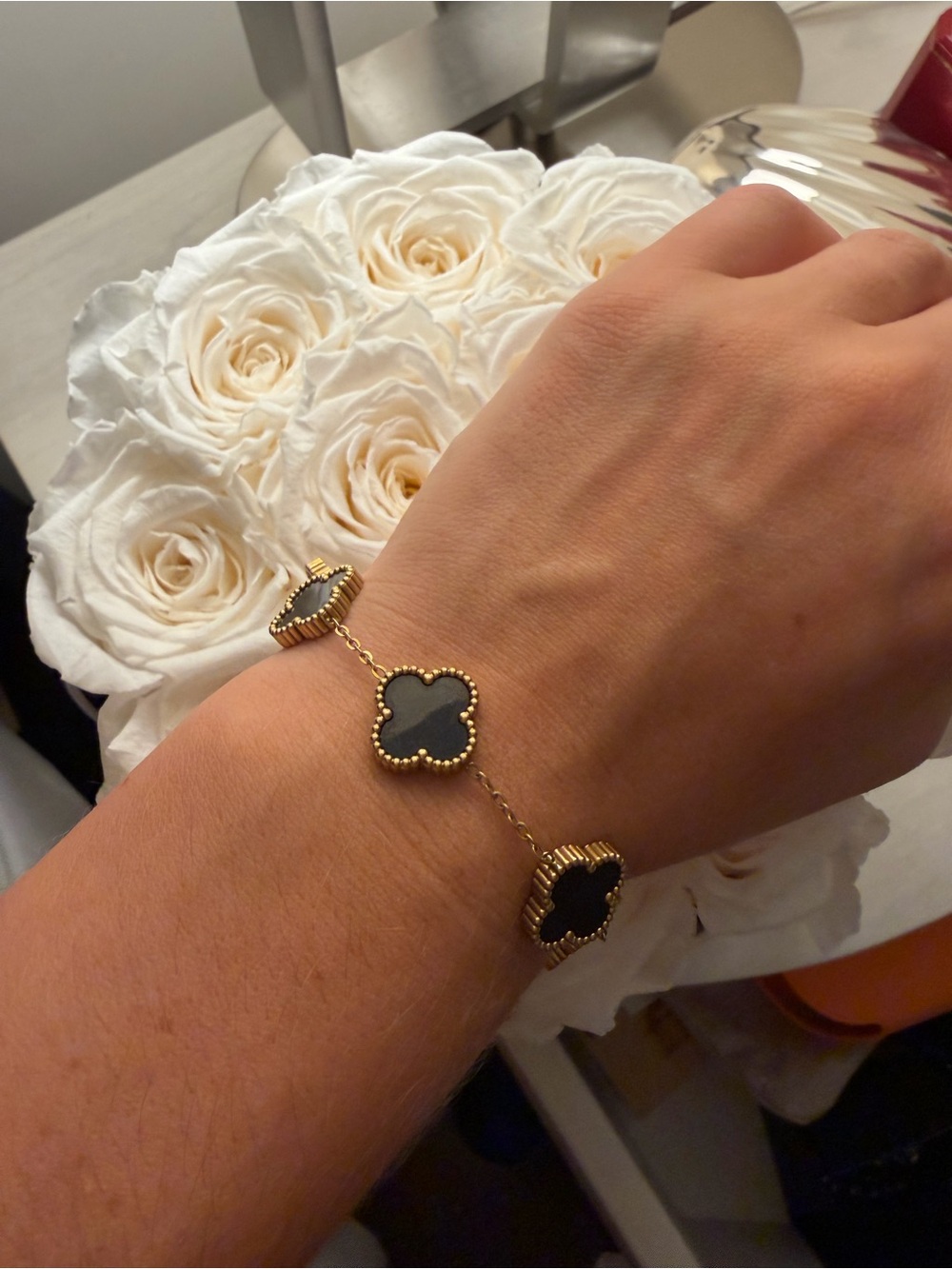 Gold Clover Link Bracelet with Black Stones